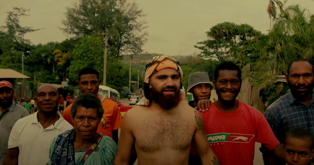 Vallé with friends and family in Papua New Guinea