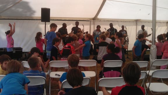 Tikorangi school children enjoy the music of Bassekou Kouyate and Ngoni Ba who will be playing at WOMAD.