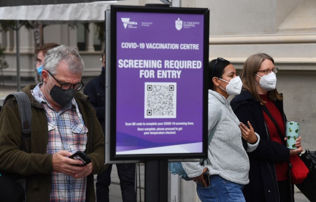People arrive at a vaccination centre in Melbourne on May 27, 2021 after five million people in Melbourne were ordered into a snap week-long lockdown following another Covid-19 virus outbreak.