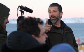 US businessman Donald Trump Jr. looks on after arriving in Nuuk, Greenland on January 7, 2025. - Donald Trump Jr made a private visit to Greenland, a Danish autonomous territory coveted by Trump Sr and which hopes to one day be independent but remains dependent on Copenhagen for now. (Photo by Emil Stach / Ritzau Scanpix / AFP) / Denmark OUT / DENMARK OUT