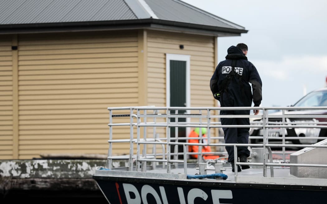 The Wellington police boat returns to harbour on 24 May 2024 after spending the day looking for a man who went missing after falling from the East By West ferry.