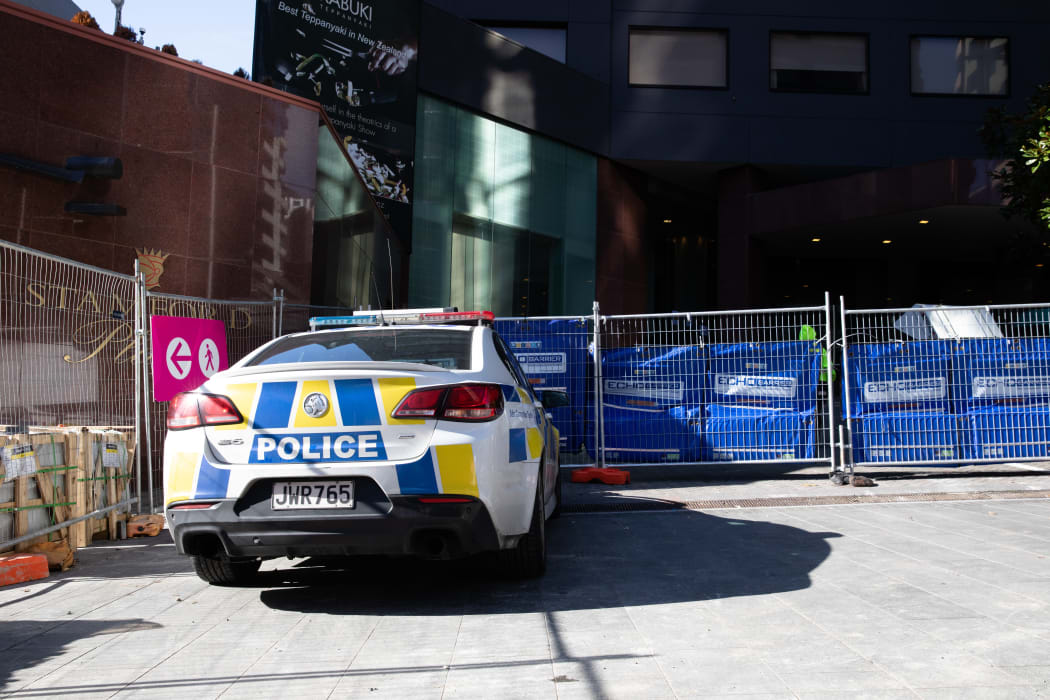 A police car outside Stamford Plaza, which is being used as a managed isolation facility, in Auckland's CBD.