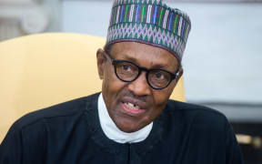 Nigeria's President Muhammadu Buhari speaks during a meeting with US President Donald Trump in the Oval Office of the White House in Washington, DC, April 30, 2018.
