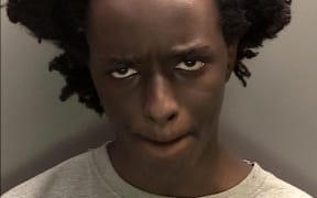 A handout image released by Merseyside Police and received in London on January 20, 2025, shows the custody photograph of Axel Rudakubana who has pleaded guilty to killing three young girls in a stabbing attack in 2024 last year that sparked the UK's most violent riots in a decade.