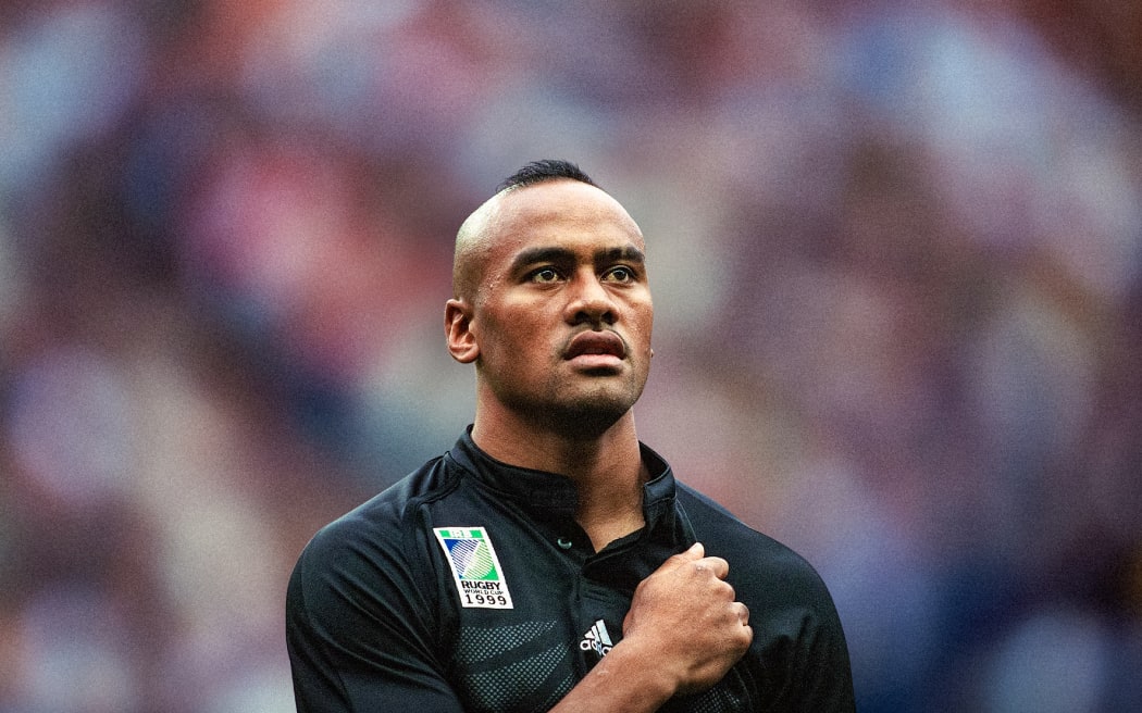 Jonah Lomu (New Zealand) holds his hand over his heart during the singing of the national anthem before a Webb Ellis Cup match between the All Blacks and England.   (Photo by Jean-Yves Ruszniewski/TempSport/Corbis/VCG via Getty Images)