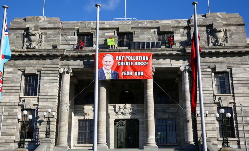Protesters on Parliament roof.