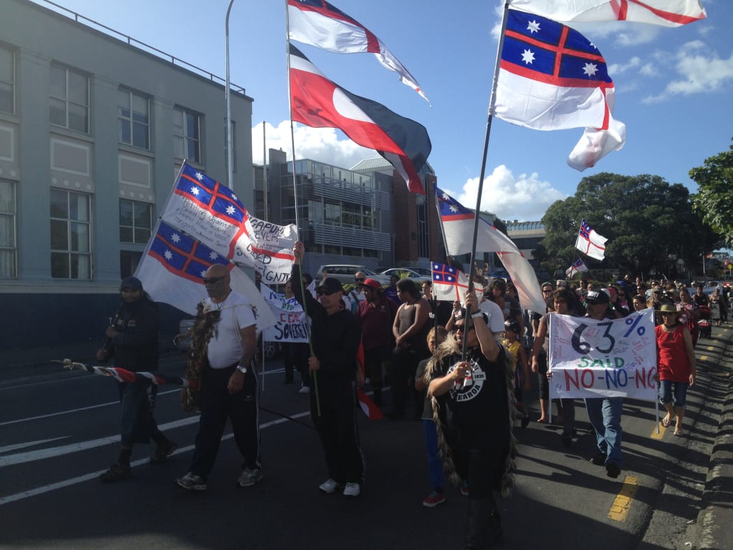 A group of protesters - including members of rival faction Te Kotahitanga - take to the streets to oppose Tūhoronuku's appointment to carry out treaty negotiations on behalf of Ngāpuhi.