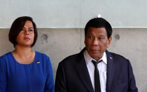 The President of the Philippines Rodrigo Duterte next to his daughter Sara (L) on September 3, 2018 during his visit to the Yad Vashem Holocaust Memorial museum in Jerusalem