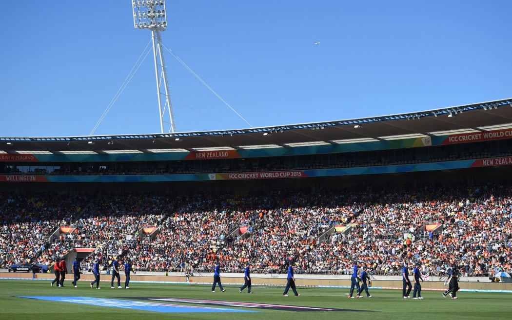 Players leave the field at the tea break during the ICC Cricket World Cup match between New Zealand and England in Wellington.