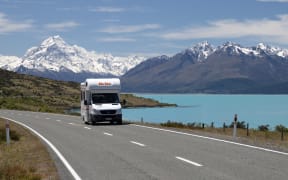 Campervan on Mount Cook Road with Mount Cook and Lake Pukaki, Mount Cook National Park, UNESCO World Heritage Site, Canterbury, South Island, New Zealand.