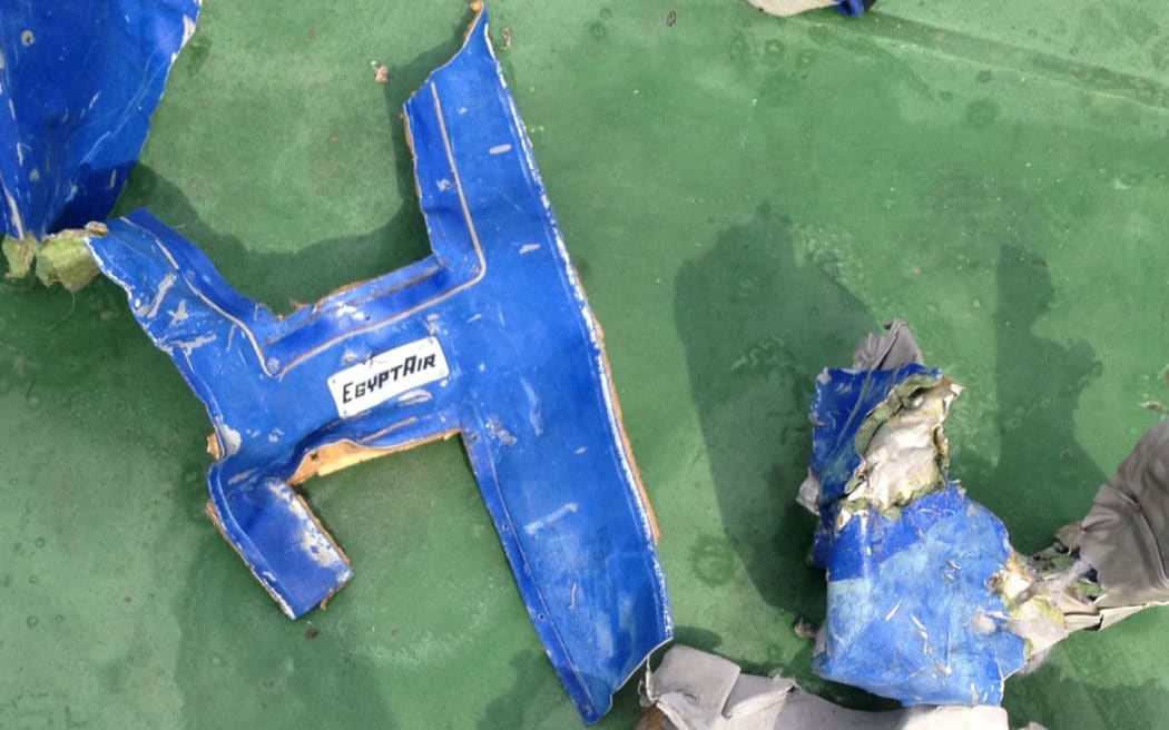 A picture uploaded on the official Facebook page of the Egyptian military spokesperson on May 21, 2016 and taken from an undisclosed location reportedly shows some debris that the search teams found in the sea after the EgyptAir Airbus A320 crashed in the Mediterranean.