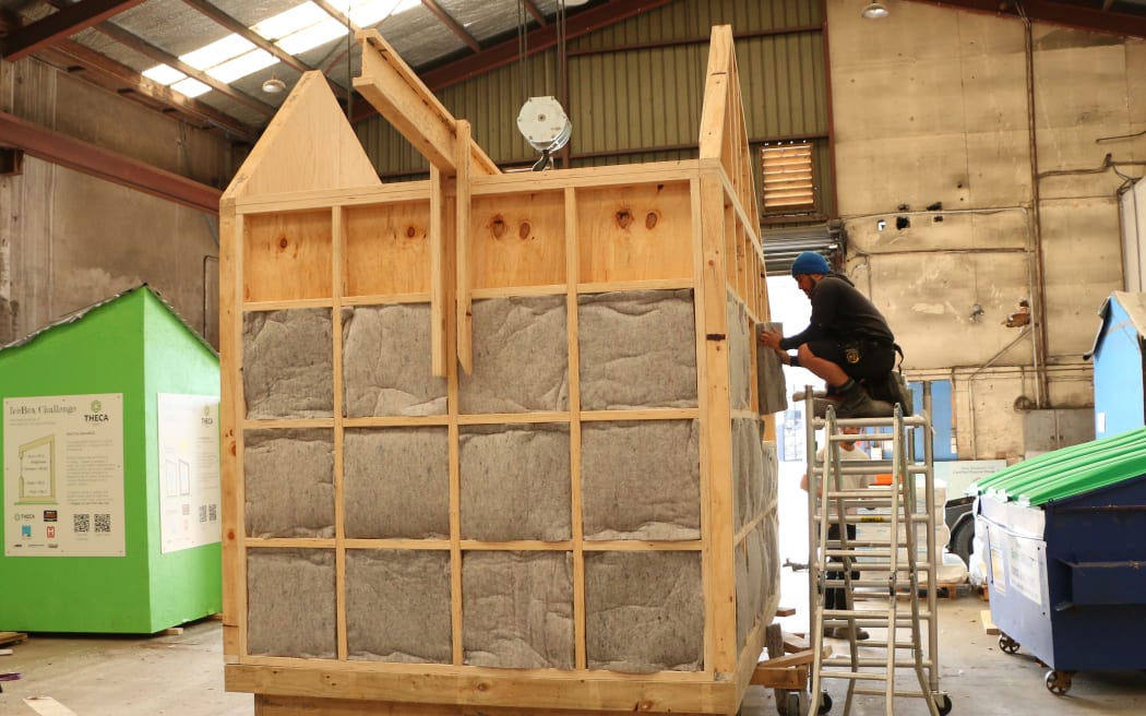 Paora Smallman works on the tiny house protoype