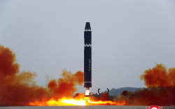 This picture taken on February 18, 2023 and released from North Korea’s official Korean Central News Agency (KCNA) on February 19, 2023 shows test-firing of the intercontinental ballistic missile (ICBM) “Hwasong-15”, at Pyongyang International Airport. (Photo by STRINGER / KCNA VIA KNS / AFP) / South Korea OUT / —-EDITORS NOTE—- RESTRICTED TO EDITORIAL USE - MANDATORY CREDIT “AFP PHOTO/KCNA VIA KNS” - NO MARKETING NO ADVERTISING CAMPAIGNS - DISTRIBUTED AS A SERVICE TO CLIENTS / THIS PICTURE WAS MADE AVAILABLE BY A THIRD PARTY. AFP CAN NOT INDEPENDENTLY VERIFY THE AUTHENTICITY, LOCATION, DATE AND CONTENT OF THIS IMAGE —- /