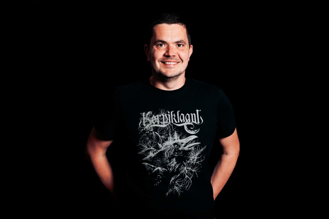 RNZ IT systems administrator and metal fan Kirill Kirichai in his Korpiklaani t-shirt