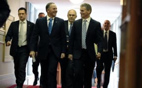 PM John Key and Finance Minister Bill English head into the debating chamber