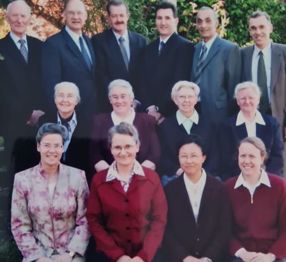 A photo of ministers visiting from overseas in 2007 includes Dean Bruer -  second in, top left.
