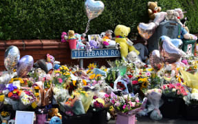 Floral tributes were left for the victims following the deadly knife attack in Southport, northwest England, on 29 July.