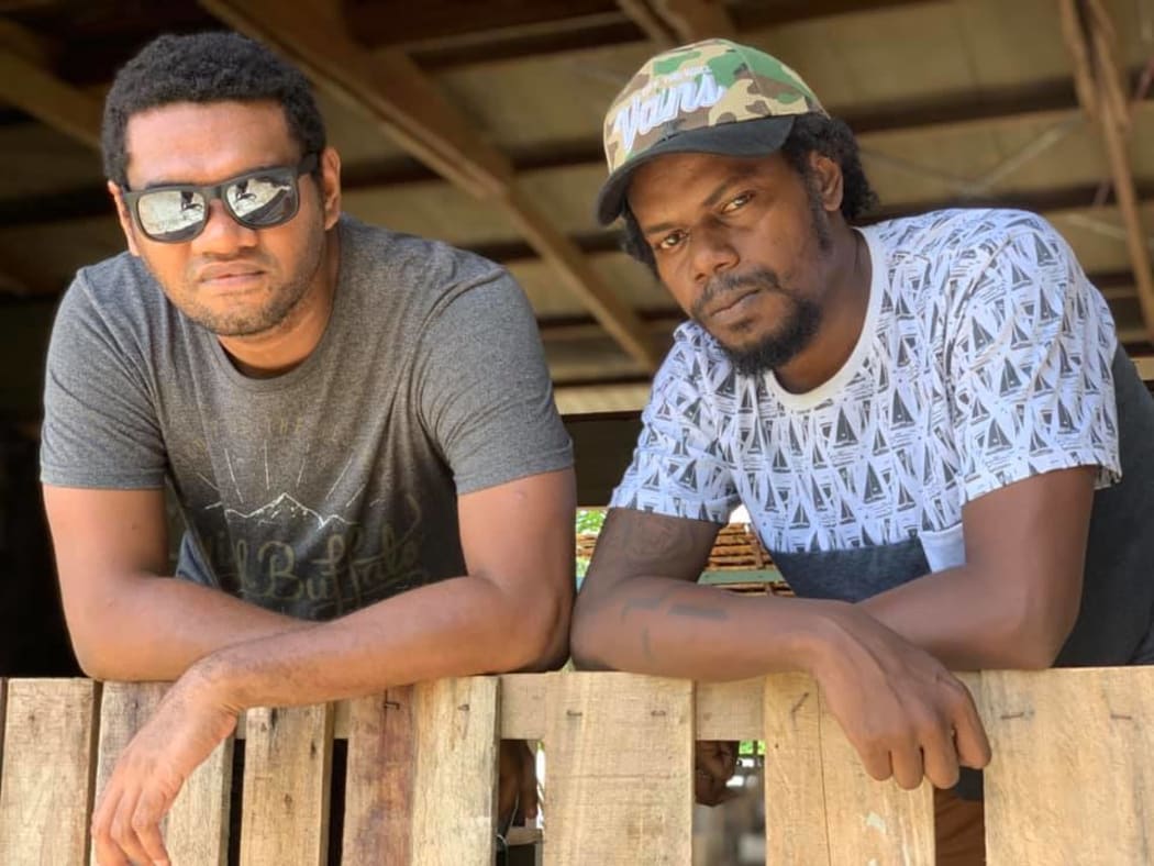Sons of Solomon lead guitarist Floyd Kofela (L) and clean vocals Fearly Kofana.