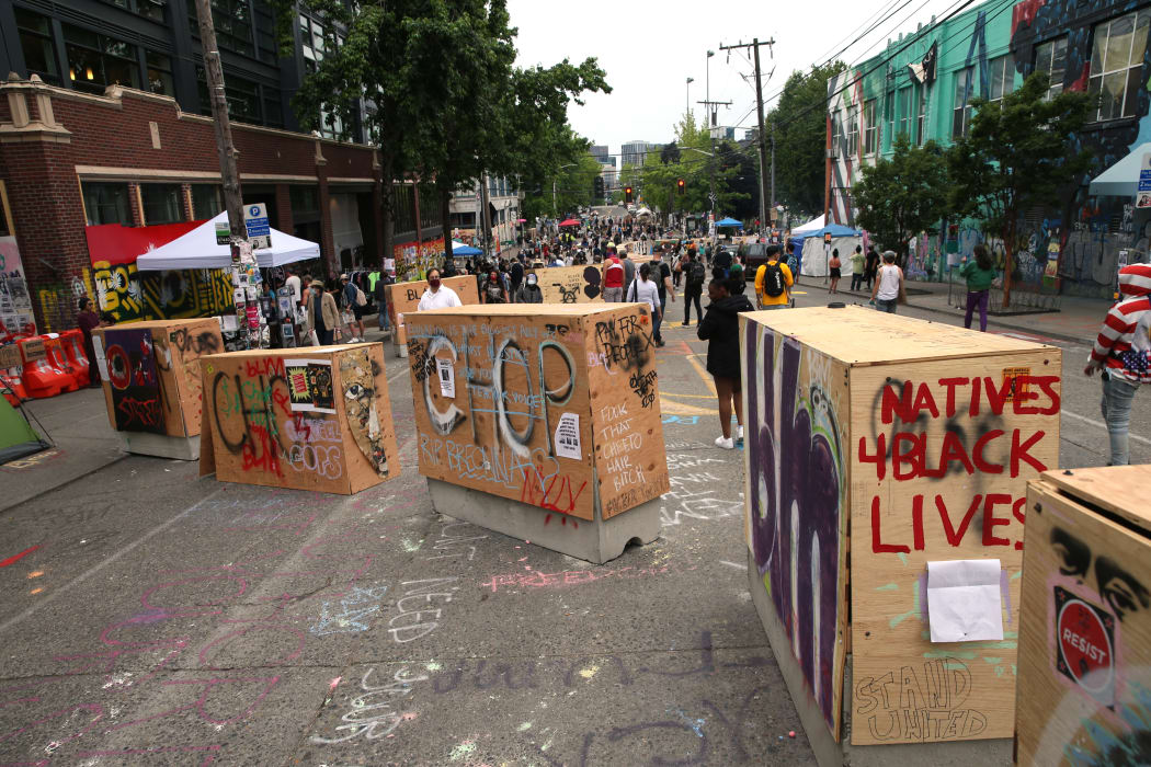 Barricades erected by the city several days ago divide up the CHOP zone in Seattle.
