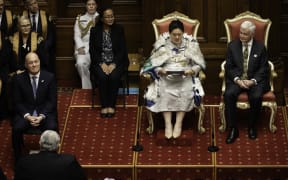 Prime Minister Christopher Luxon listens to Governor-General Dame Cindy Kiro delivering his Speech from the Throne.