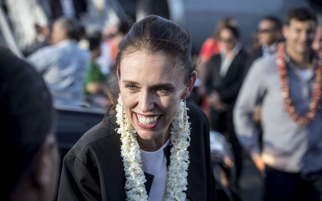 Prime Minister Jacinda Ardern chats with local media upon arrival in Samoa.