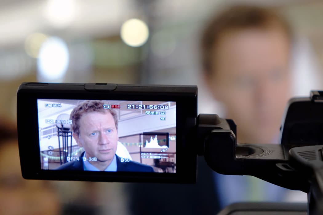 Russel Norman speaks to media after a Green Party event.