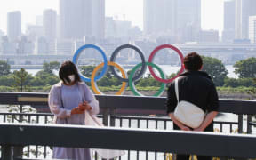 A photo shows a five-ring Olympic emblem at Odaiba Marine Park water area in Minato Ward, Tokyo on May 30, 2021.