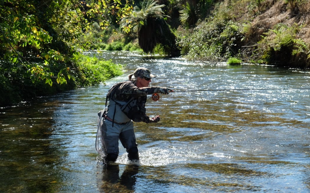 Taupo's Rachel McNae casts her line into the rapids. She is captain of the Fly Ferns, the New Zealand women's fly fishing team.