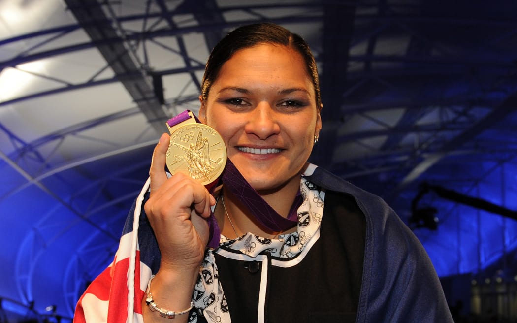 Valerie Adams receives her gold medal for the Women's Shot Put at the 2012 London Olympic Games at a special function at The Cloud in Auckland. Wednesday 19 September 2012.