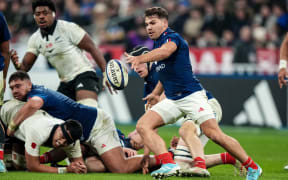 France's Antoine Dupont in action against the All Blacks, 2024.