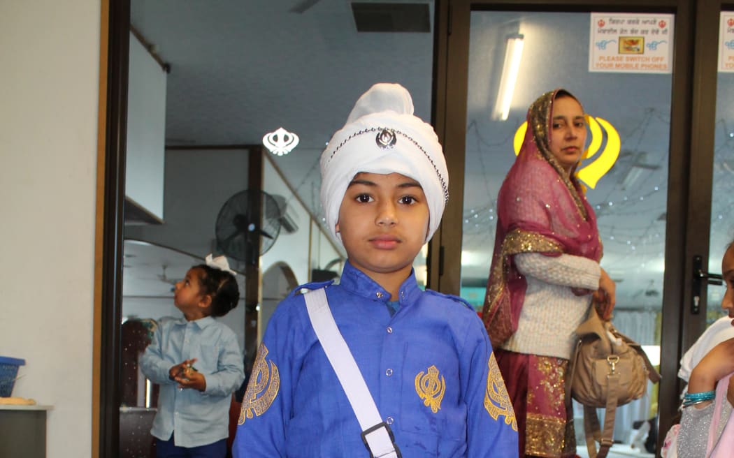 Sikh boy wears the five Ks