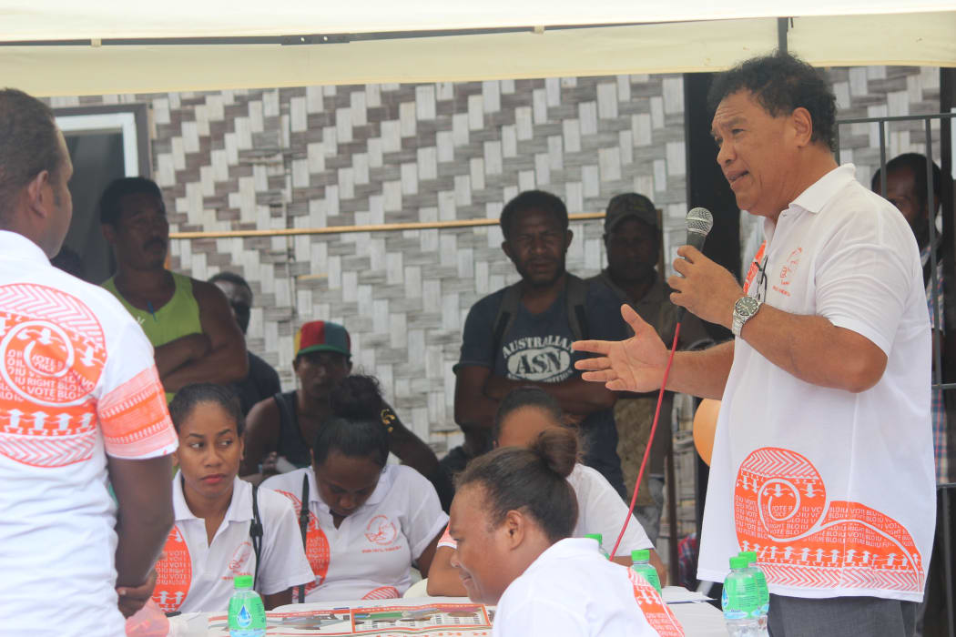 Chief Electoral Officer of the Solomon Islands Electoral Commission,  Moses Saitala, speaks to voters about the Biometric Voter Registration update exercise in Honiara Solomon Islands. 12 August 2018.