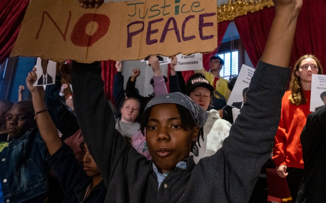 NASHVILLE, TN - APRIL 06: Protesters calling for gun reform laws and showing support for the three Democratic representatives who are facing expulsion, stand in the House gallery as legislators start the morning session at the Tennessee State Capitol building on April 6, 2023 in Nashville, Tennessee. Democratic Reps. Justin Pearson of Memphis, Justin Jones of Nashville, and Gloria Johnson of Knoxville face expulsion from the state legislature after they led a protest at the Capitol in the wake of a mass shooting where three students and three adults were killed on March 27 at the Covenant School in Nashville.   Seth Herald/Getty Images/AFP (Photo by Seth Herald / GETTY IMAGES NORTH AMERICA / Getty Images via AFP)