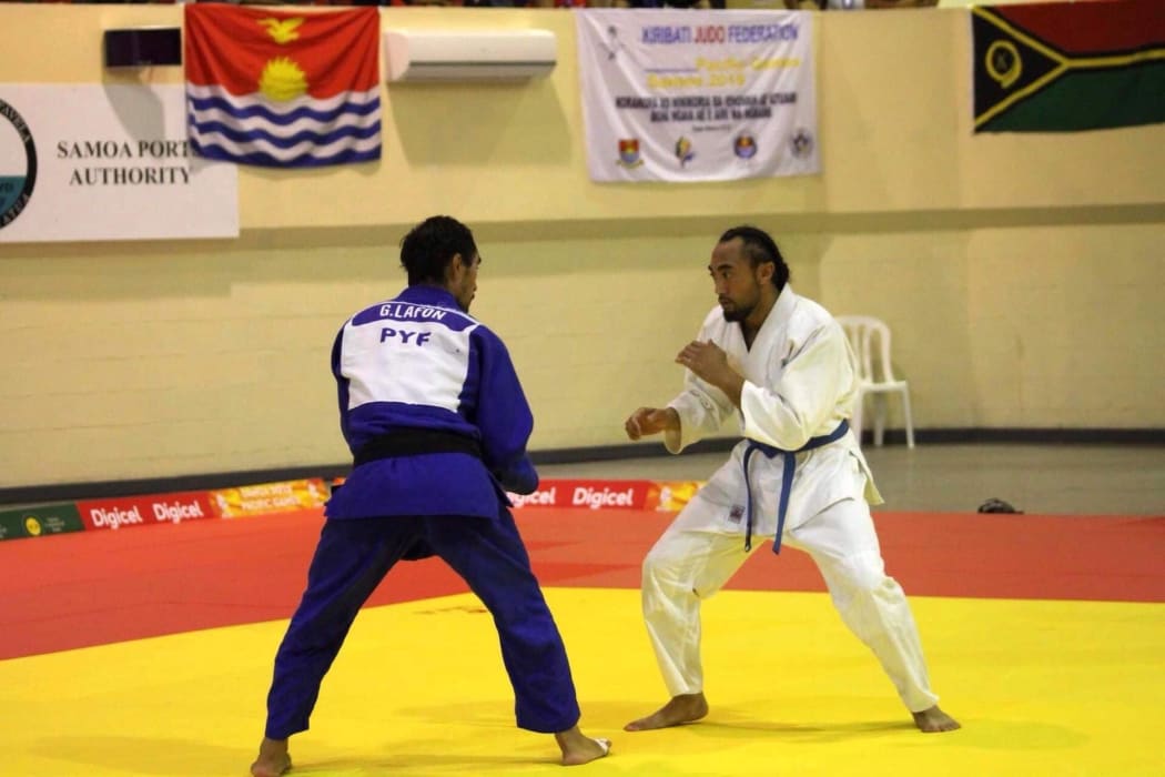 Ilai Ualesi Elekana Manu competing in judo at the 2019 Pacific Games in Samoa.