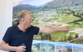 Three Parks developer Allan Dippie pointing out the location of the proposed restaurant.