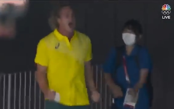 Australian swimming coach Dean Boxall celebrates Ariarne Titmus win 400m freestyle.