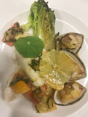 Barbequed John Dory with Cloudy Bay clams, charred cos, 
heirloom tomato and buttercup