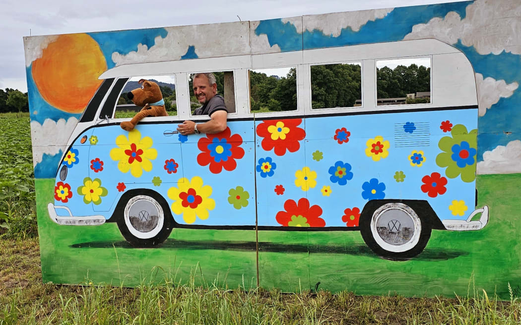 Phillip Crowder using a photo prop on the Taupiri Sunflower Farm.