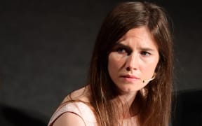(FILES) US Amanda Knox attends a panel discussion titled "Trial by Media" during the Criminal Justice Festival in Modena, northern Italy on June 15, 2019. Amanda Knox said on June 03, 2024 she would be back in court in Italy this week for a slander case linked to her conviction and later acquittal for the murder of her British roommate. Knox, from Seattle, was 20 when she was arrested alongside her then Italian boyfriend and a Congolese bar owner over the brutal killing of 21-year-old exchange student Meredith Kercher in their shared apartment in Perugia. (Photo by Vincenzo PINTO / AFP)