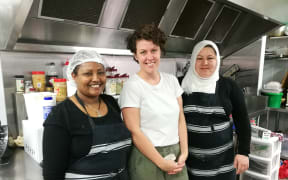 From left, Genet Seyoum, Pomegranate Kitchen co-founder Rebecca Stewart, and Fatima Qasim Ali.
