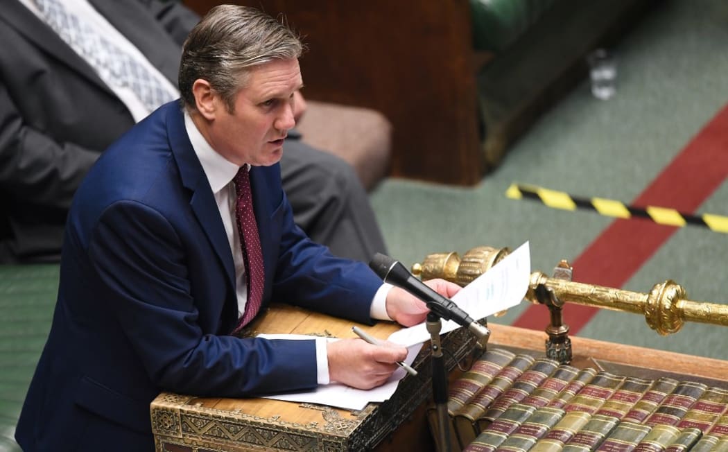 A handout photograph released by the UK Parliament shows Britain's main opposition Labour Party leader Keir Starmer. Prime Minister Boris Johnson on Wednesday said a new UK-wide lockdown would be a "disaster.