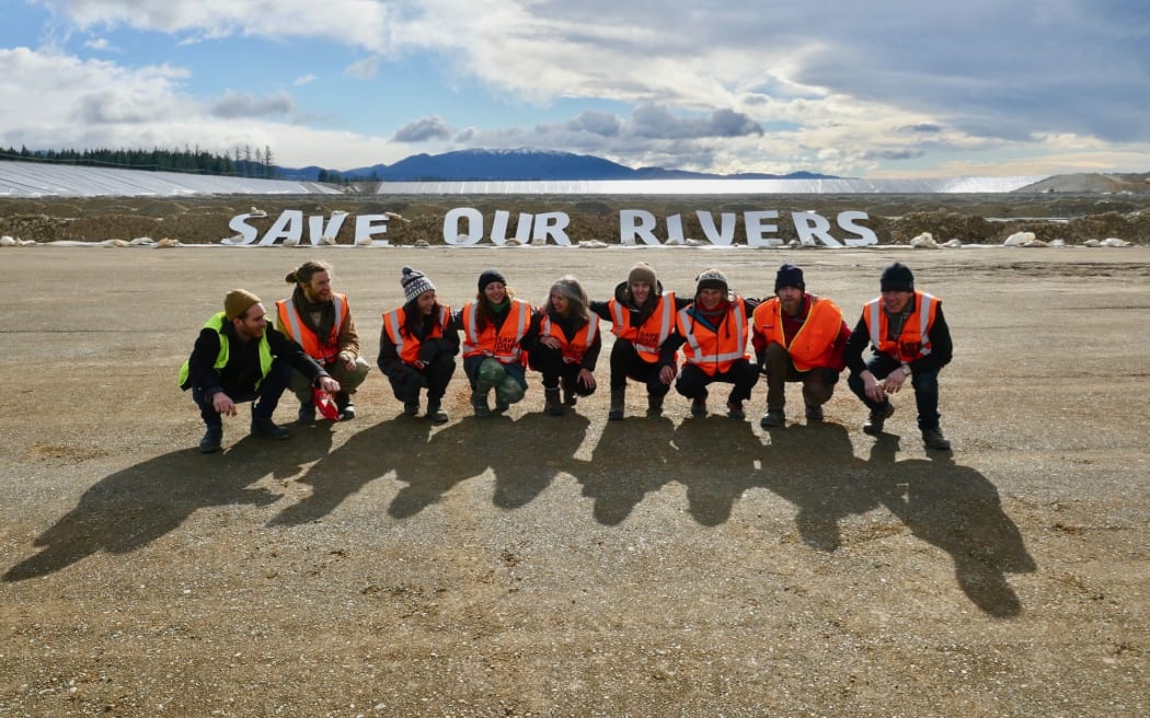Greenpeace protesters at an irrigation dam near Christchurch, before they were arrested for trespassing.