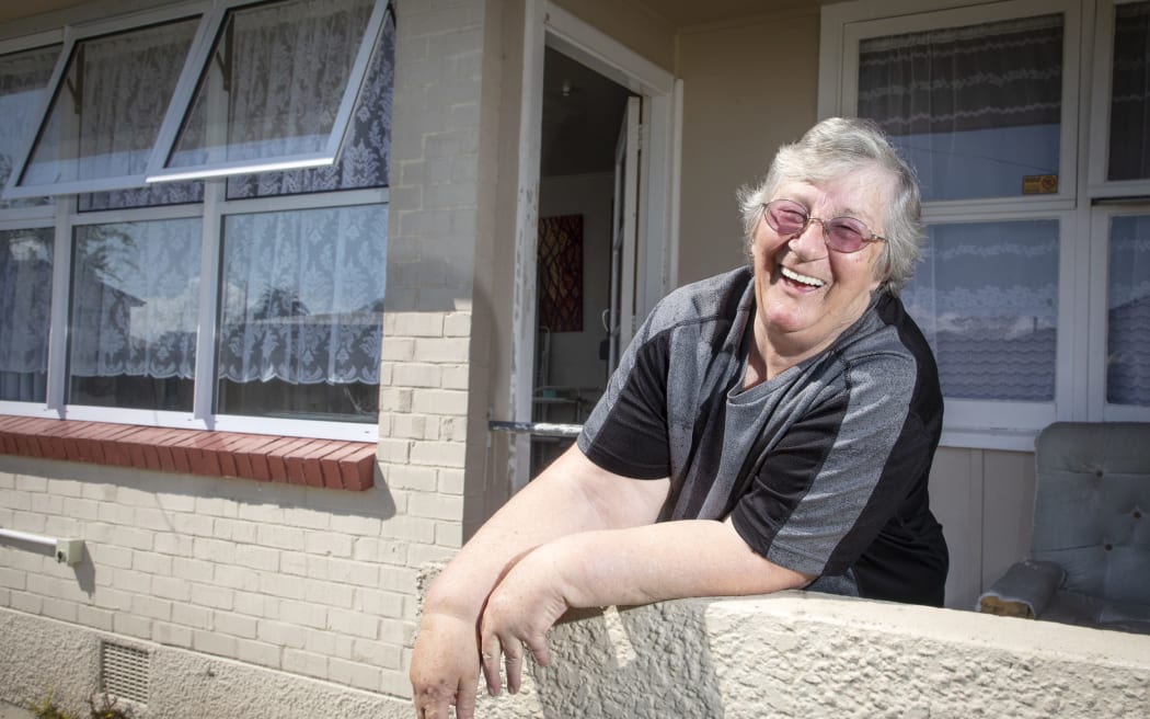 Mary Smith is delighted her new window has been installed in her council flat.