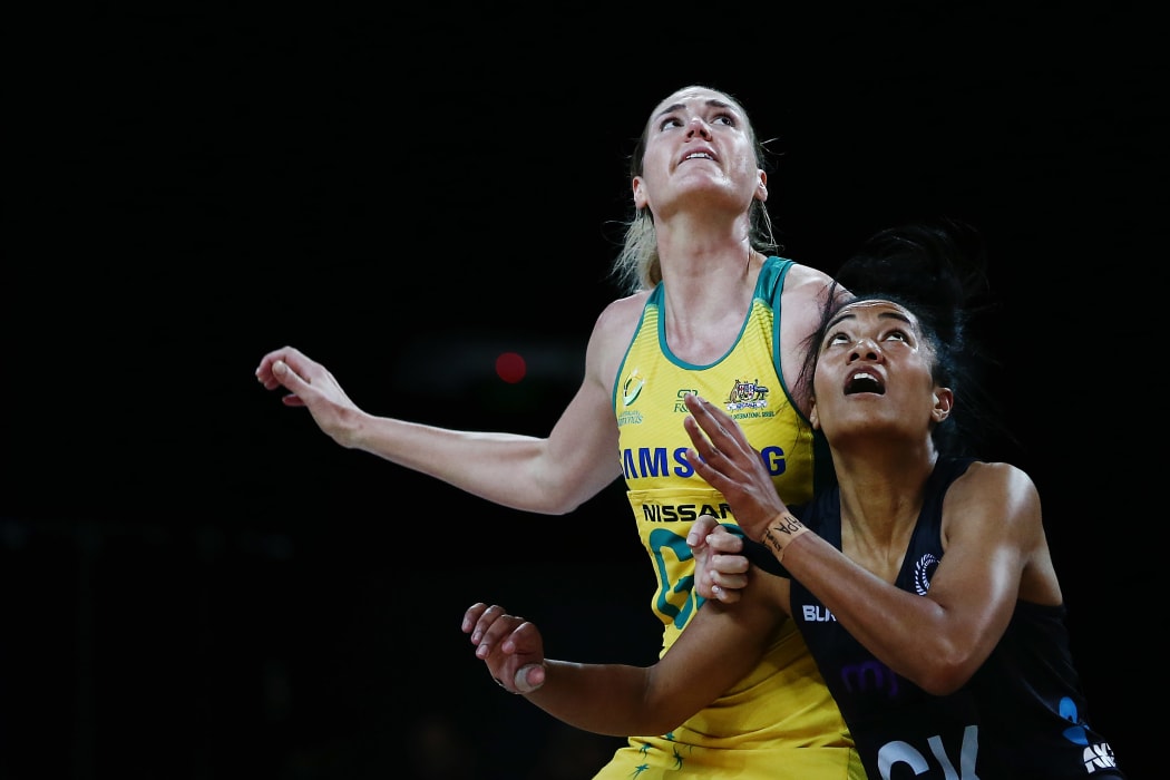 Caitlin Bassett competes against Temalisi Fakahokotau