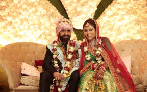 Gurpreet Kaur and her husband Parth Gandhi.