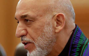 Hamid Karzai: refusing to sign.