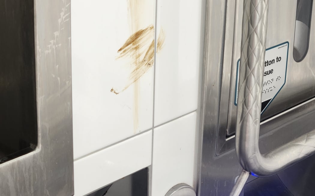Human waste smeared inside the toilet block.