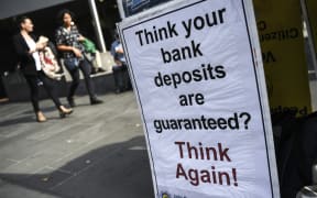 A placard outside the Australian royal commission set up in February to investigate claims of misconduct in the banking sector.