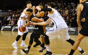 Tall Blacks player Corey Webster dribbles the ball during the Basketball World Cup qualifier match between the Tall Blacks and Korea at TSB Arena in Wellington.