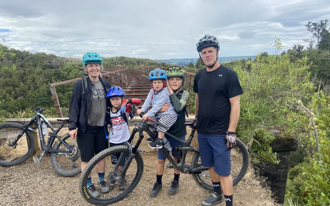 Byron Scott (right) says his children, Mac, George and Miles, are the motivation behind his dream to build a pump track in his community.
